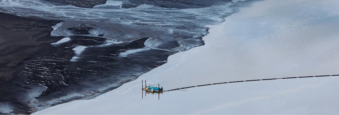 Aerial view of a measuring device placed on a glacier.